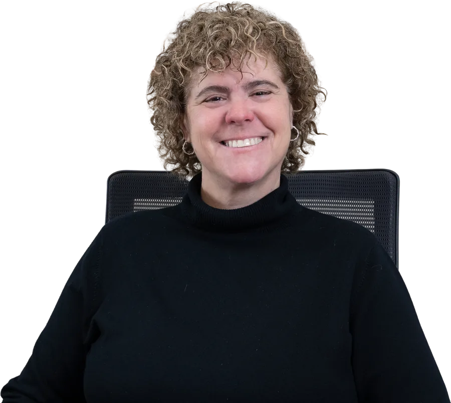 Karen A., founder of CertSmart, smiling in an office setting.